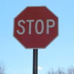 Stop sign with blue sky behind